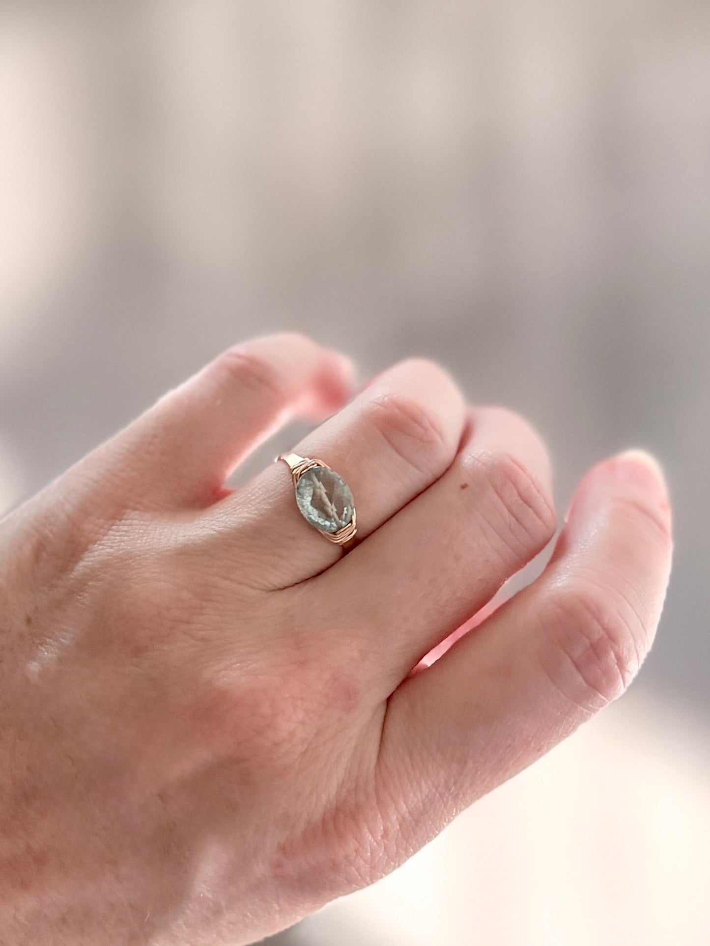 Pura Ring – Faceted Aquamarine Oval on Handmade Hammered Band