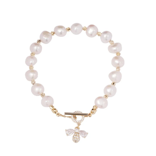 Pearl bracelet with a gold clasp on a white background