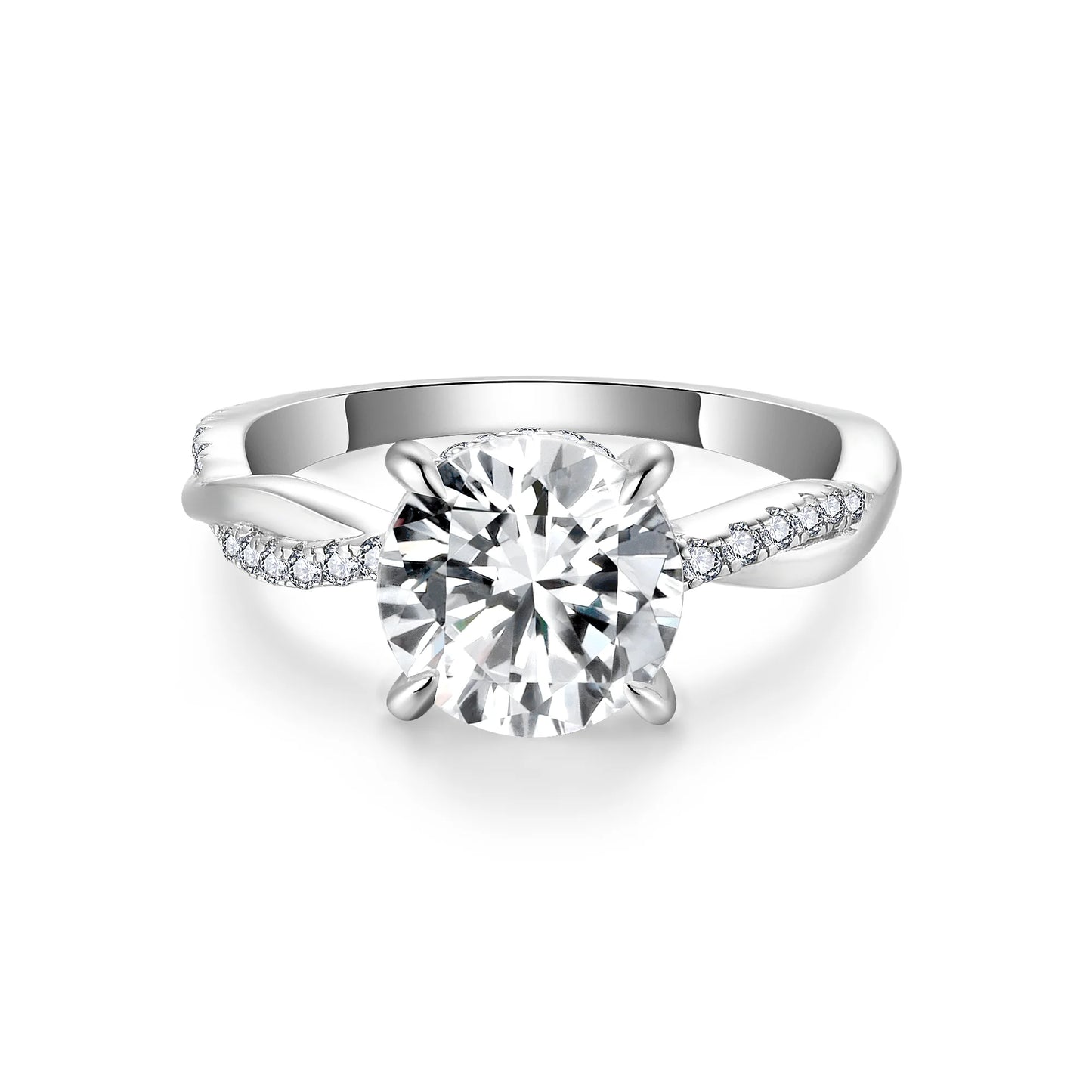 Silver ring with a large diamond and smaller diamonds on the band against a white background