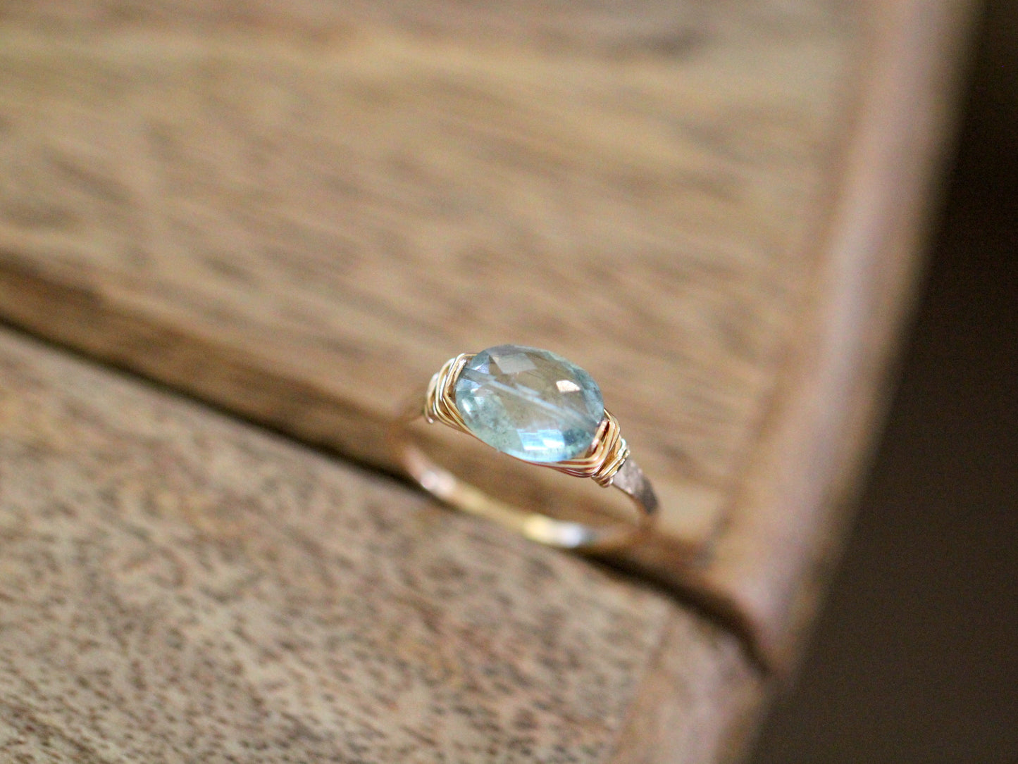 Pura Ring – Faceted Aquamarine Oval on Handmade Hammered Band