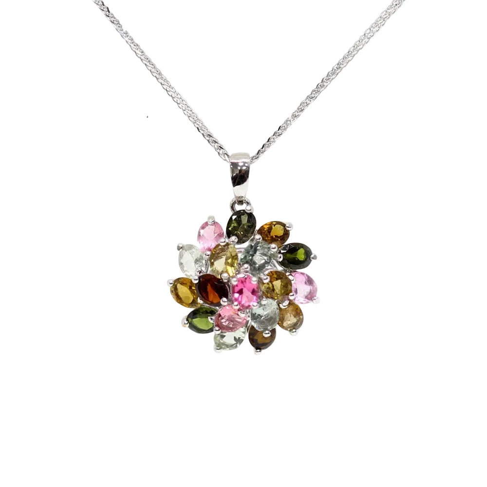 Multicolored gemstone pendant on a white background 