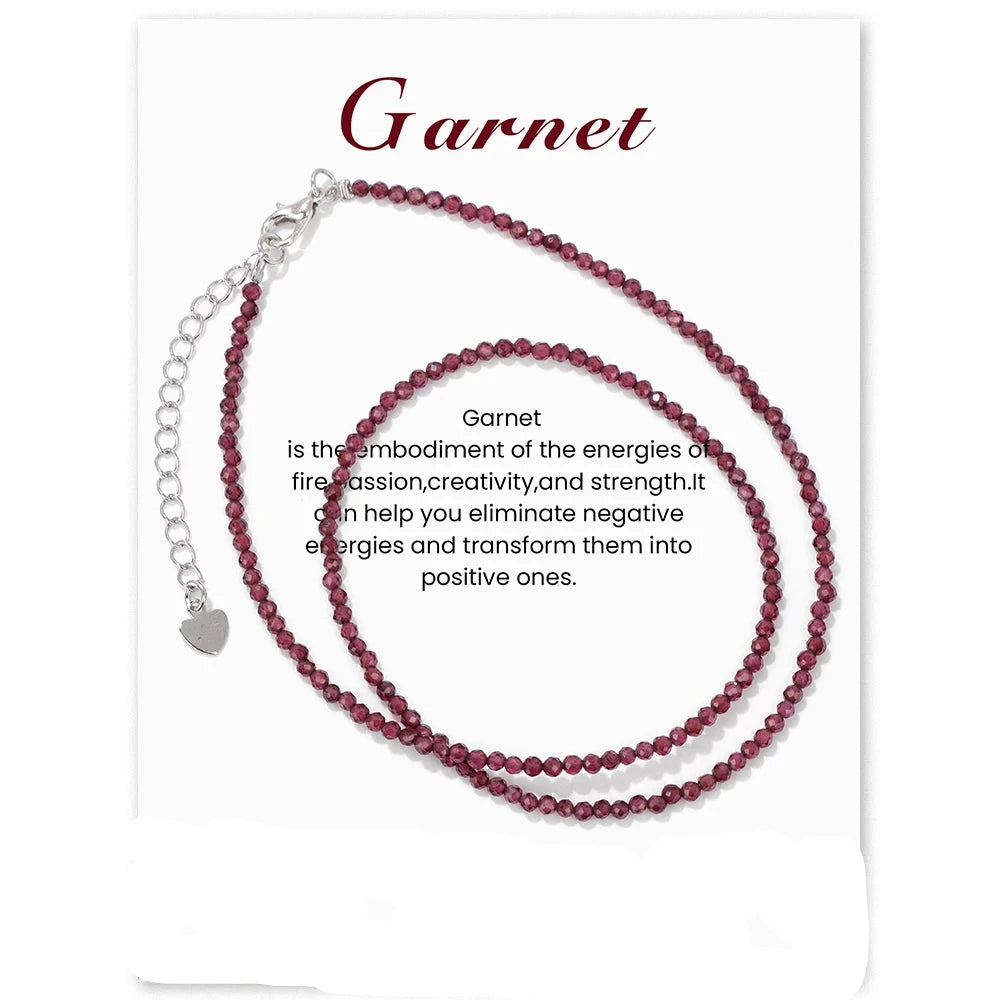 Garnet necklace with descriptive text on a white background