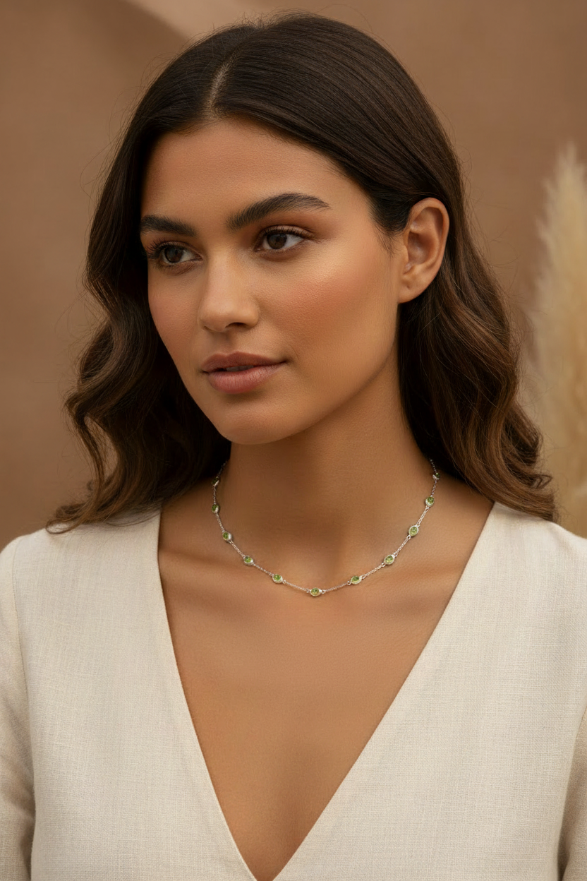 Model wearing genuine peridot by-the-yard necklace in rhodium-plated sterling silver