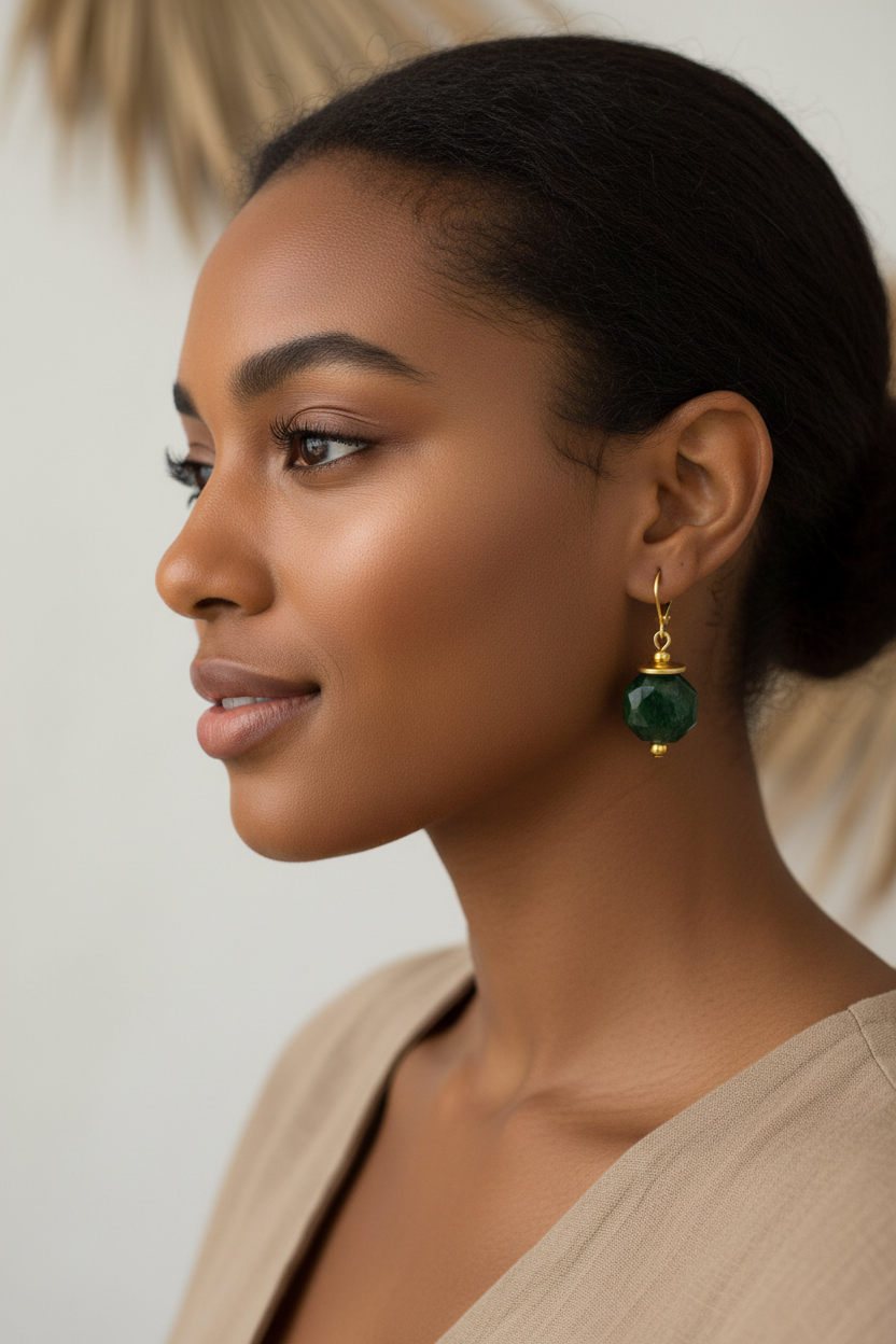 African American woman wearing green moss agate octagon matte gold leverback earrings